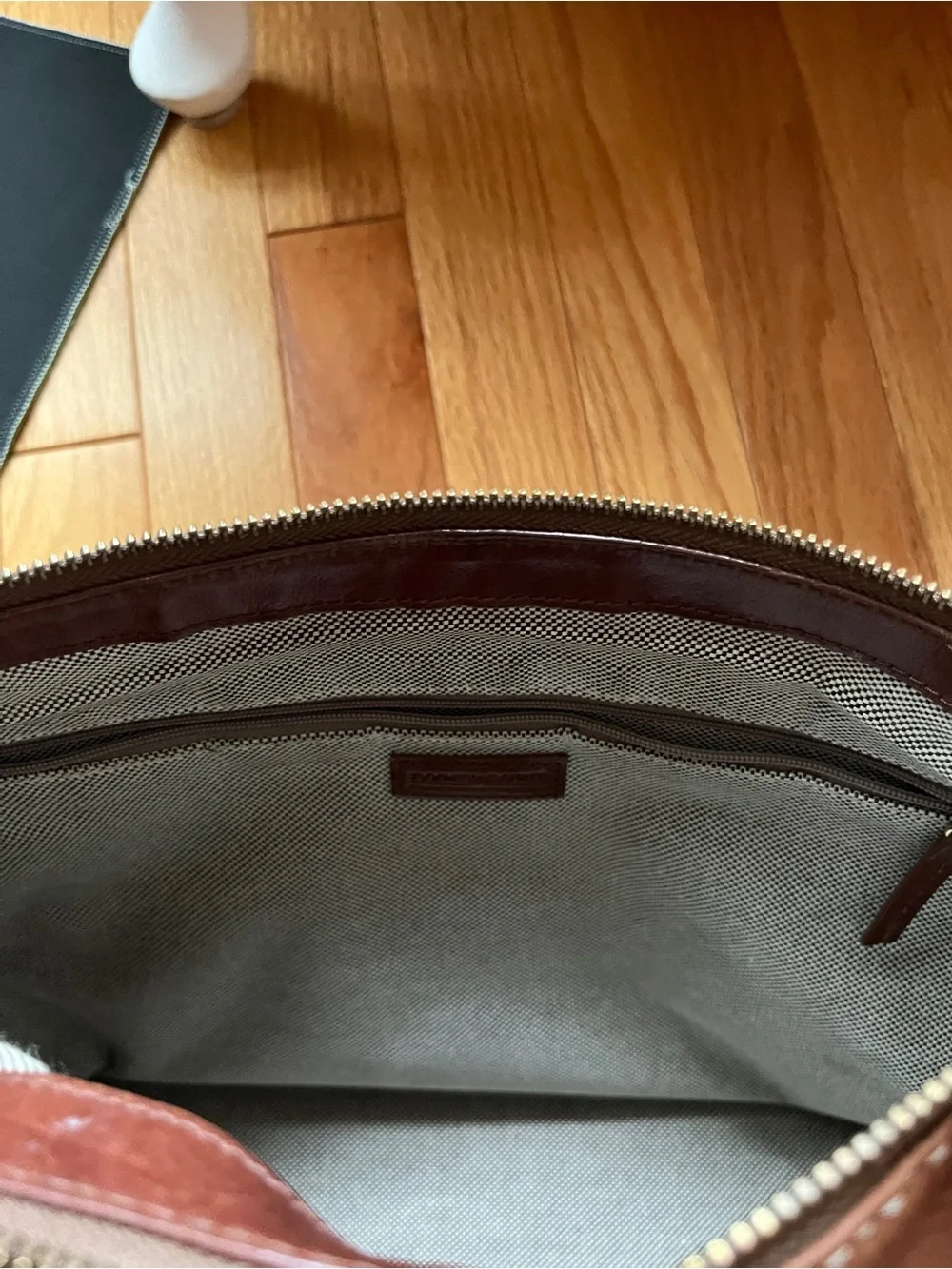 Dooney & Bourke Dark Brown Leather Messenger Bag with Brass Accents